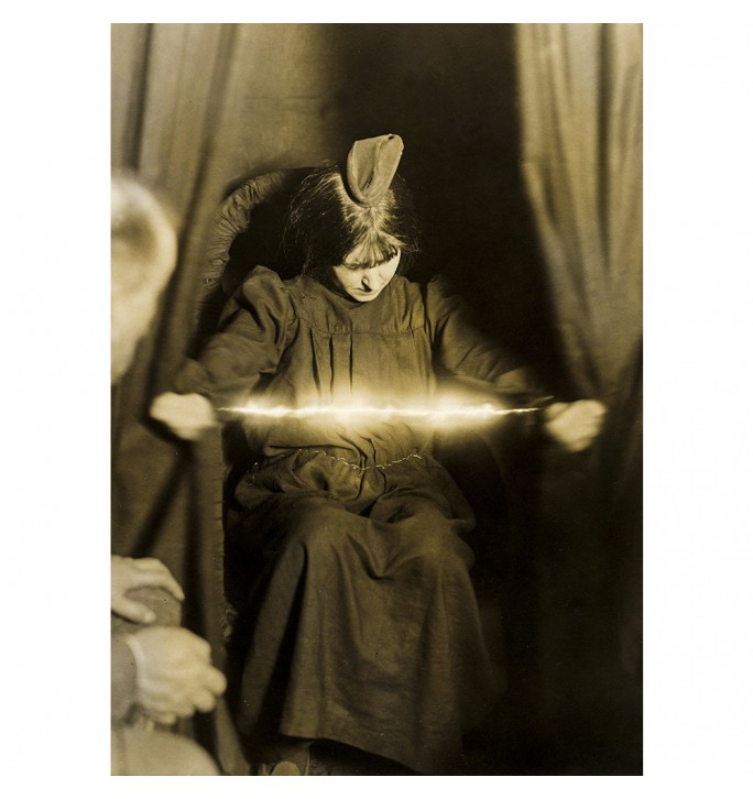 Psychic Eva Carriere at a session of materialization of ectoplasm.