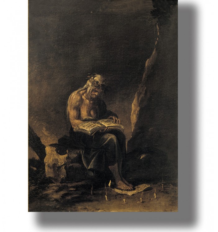 Old witch sitting in a dark cave with an open magic book and small candles around her.