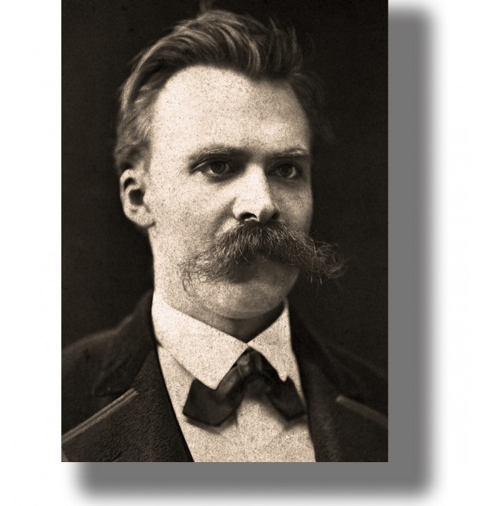 Vintage black and white portrait of Friedrich Nietzsche with a mustache and dark suit.