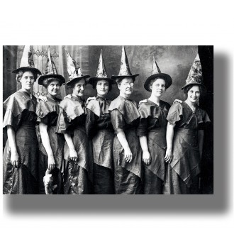 A coven of witches poses...